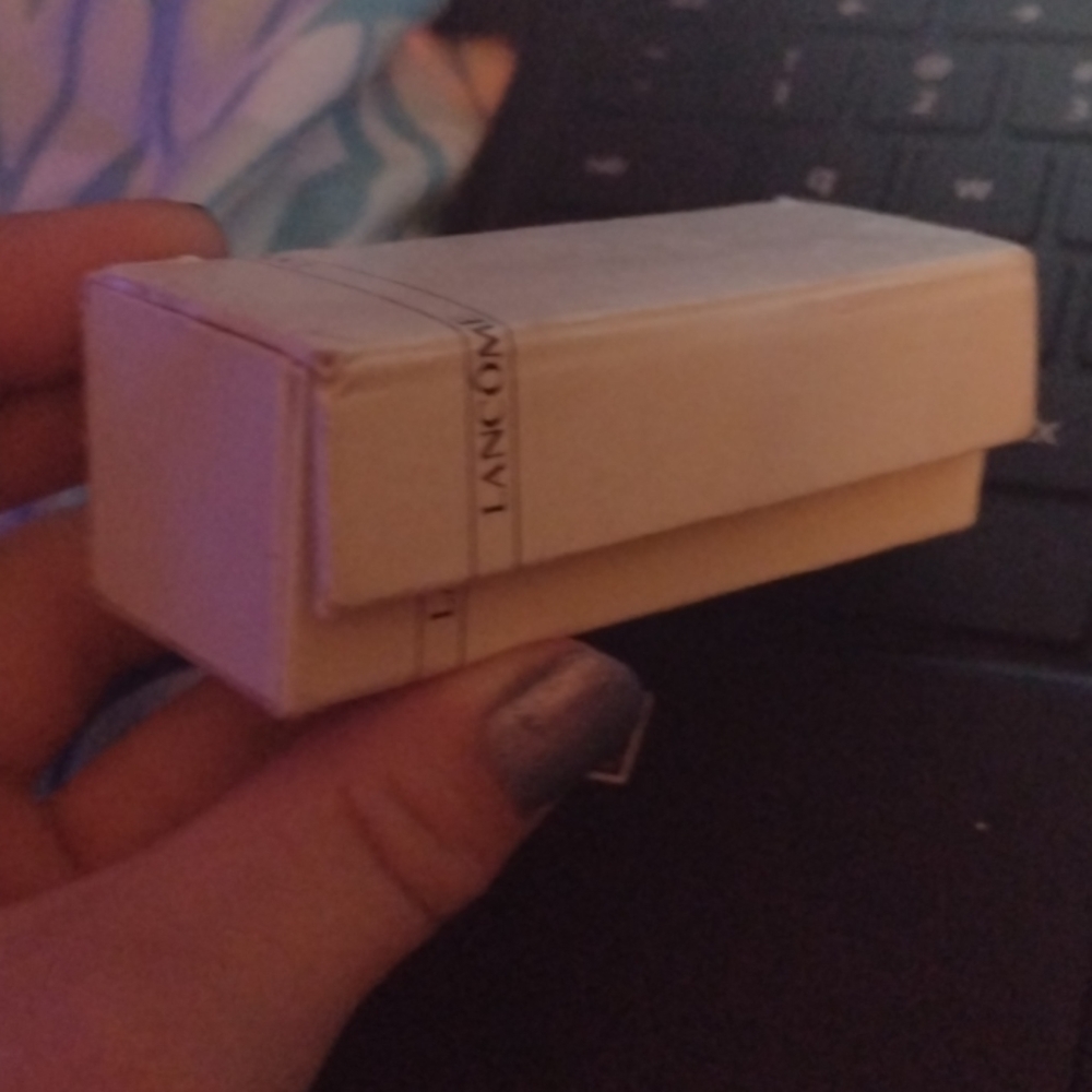 A lipstick holder with mirror